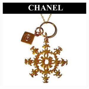 LIMITED EDITION GOLD SNOWFLAKE CHARM BY CHANEL